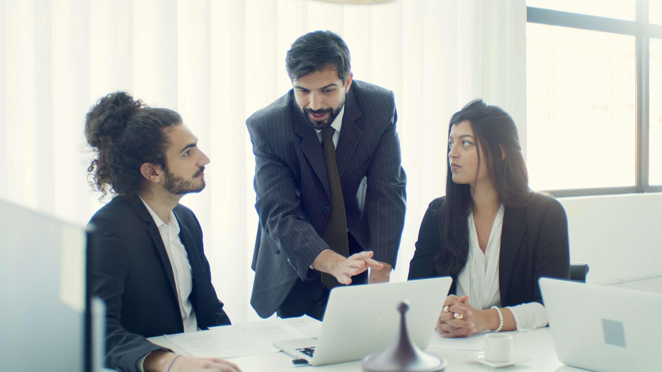 Cybersecurity team discussing incident response strategy at a conference table
