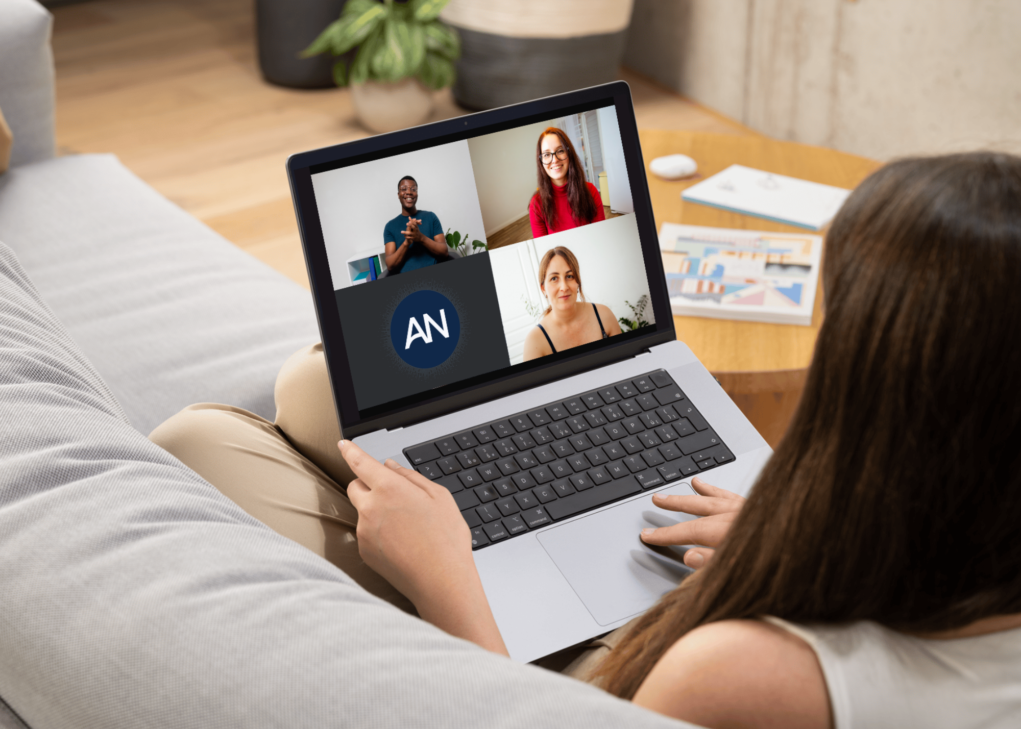 Woman participating in a virtual meeting on her laptop, using an AI Meeting Note-Taker to document key points